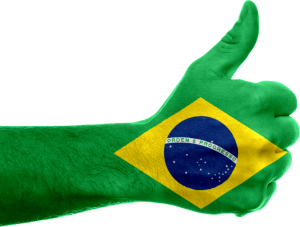 Hand with Brazilian flag painted over it giving thumbs up - just like all our satisfied customers.