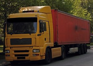 Yellow moving truck - One Moving & Logistics has the right equipment to handle your long distance relocation.