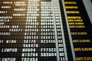 Image of airport schedule - moving from Brazil to the US is closing by.